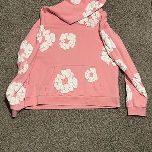 Pink danim tears Hoodie brand new. Bag and everything still there and included.